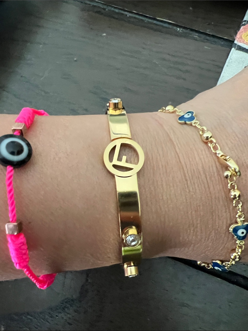 Fendi Gold Logo Bangle Bracelet with Crystal Accent